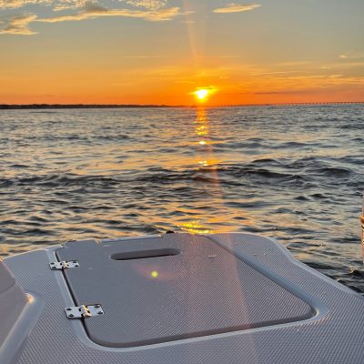 a sunset over a body of water