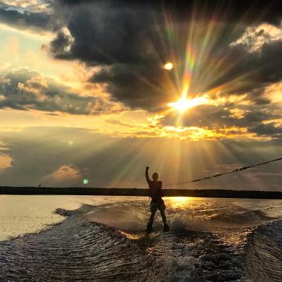 a sunset over a body of water